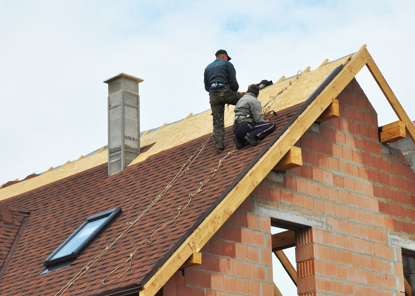 Roofers Install Asphalt Shingles.